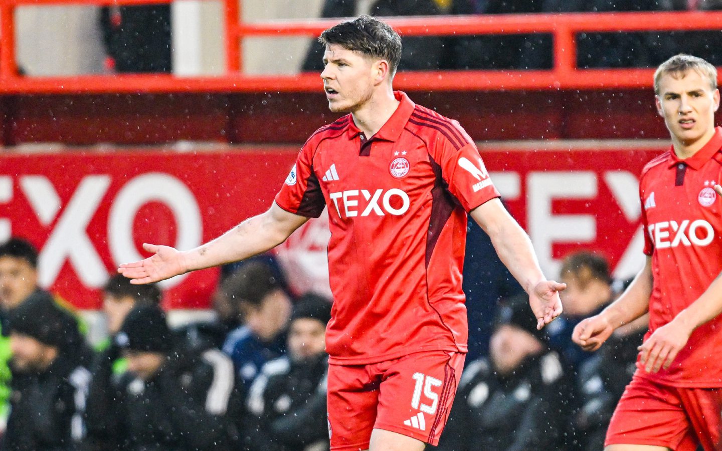 Aberdeen's Kevin Nisbet looks dejected as his strike is ruled out for offside against Livingston.