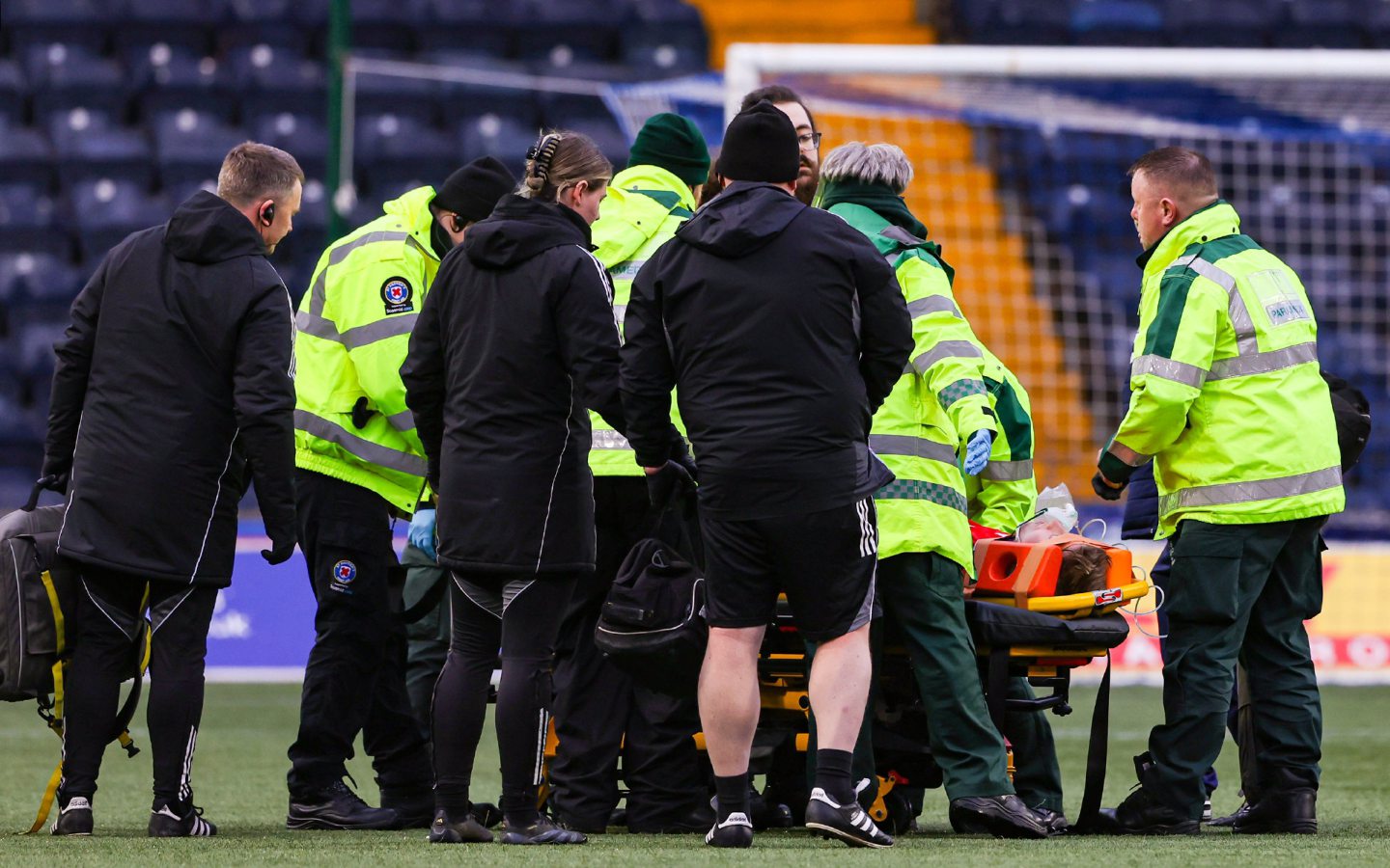 Aberdeen's Mats Knoester is stretchered off following a head collision against Kilmarnock.