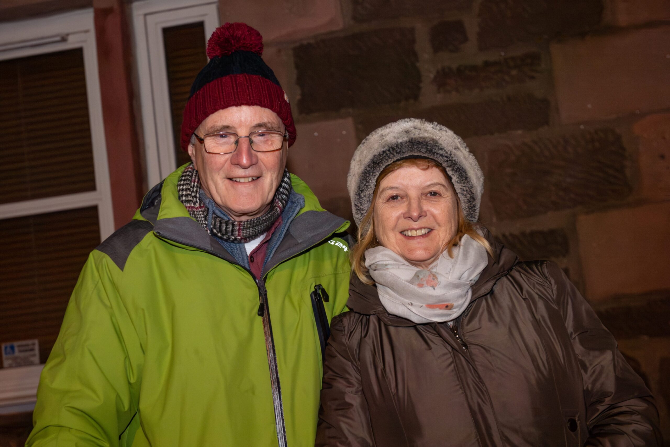 John and Deirdra Reidy attend the Stonehaven Fireballs event, wrapped up against the cold on Stonehaven High Street, January 1 2026.