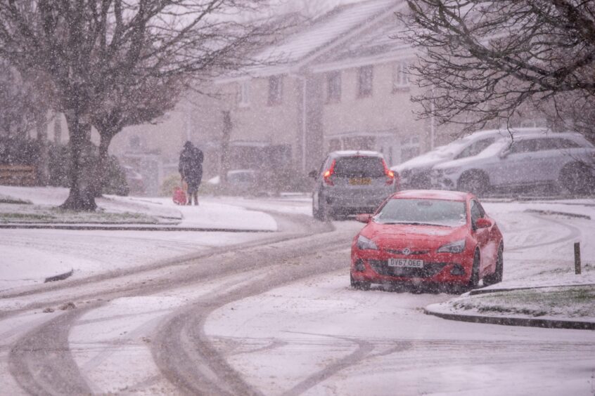 Cars is the snow in Bridge of Don.