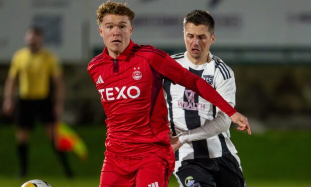 Findlay Marshall of Aberdeen, left, and Paul Young of Fraserburgh in Aberdeenshire Shield action. Image: Jasperimage.