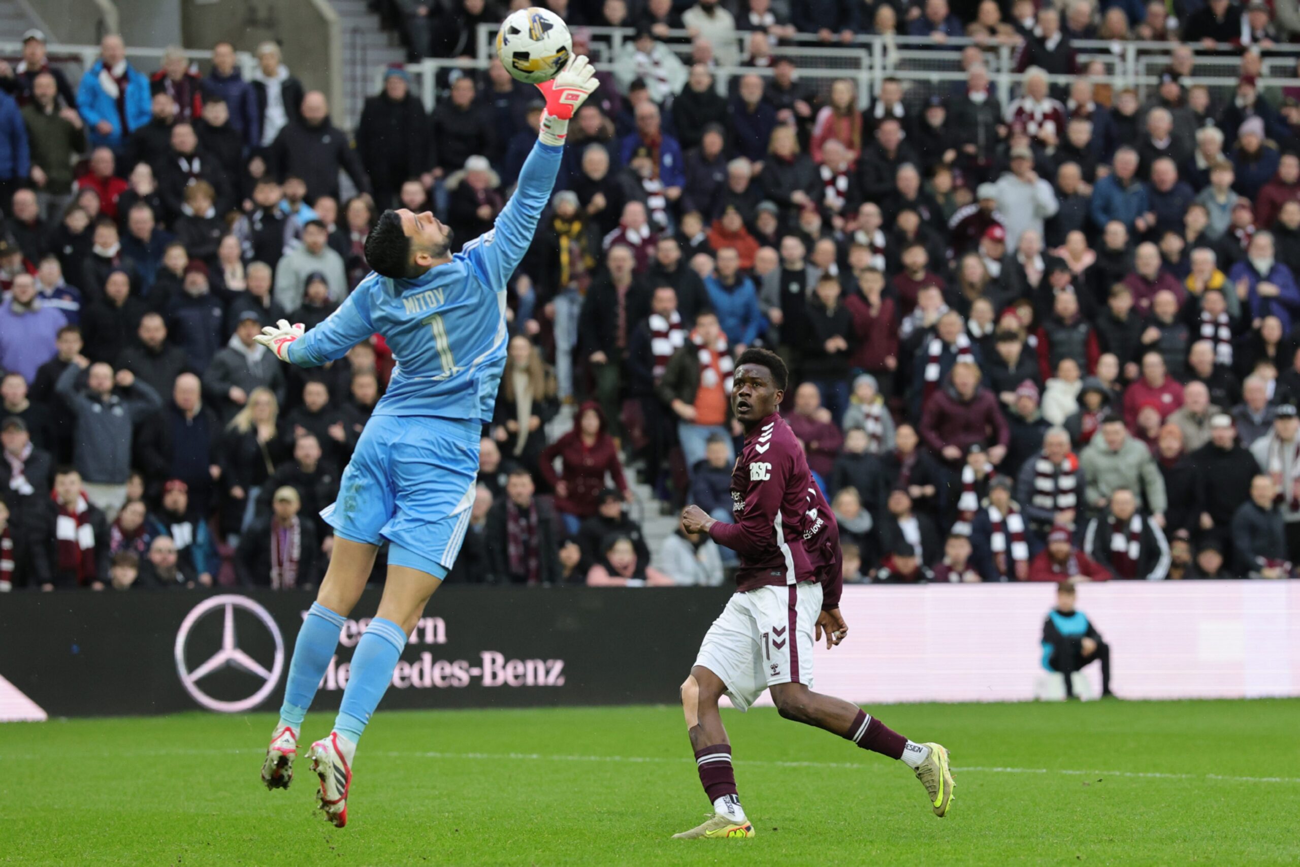 Heart of Midlothian's Pierre Landry Kabore (right) has an attempt at goal against Aberdeen. Image: Shutterstock