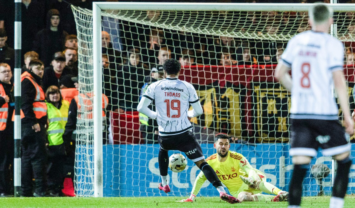 Dunfermline's Olly Thomas scores to make it 2-0 against Aberdeen in the Scottish Cup