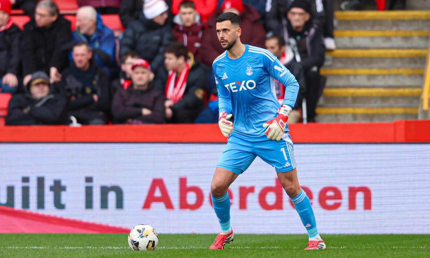 Aberdeen's Dimitar Mitov in action during during the 1-1 draw with Falkirk.