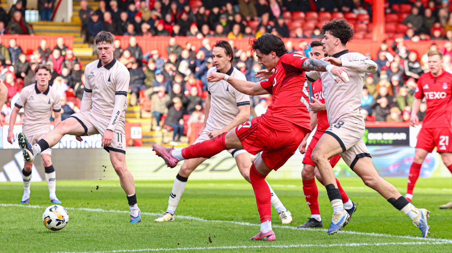 Aberdeen's Marko Lazetic has a shot at goal during the Premiership match against Falkirk.