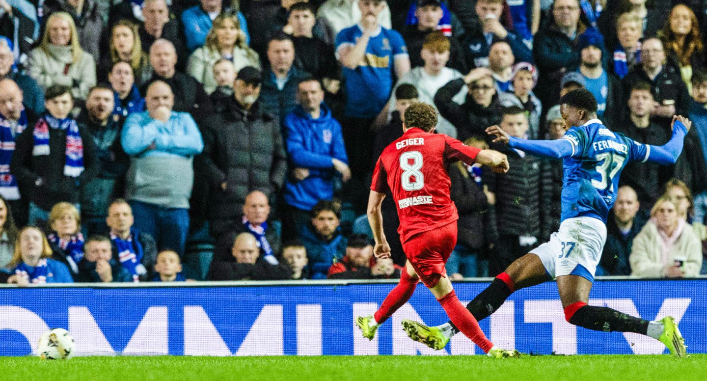 Aberdeen's Dennis Geiger scores against Rangers at Ibrox.