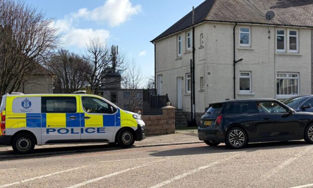 Man arrested after woman found injured at Aberdeen home