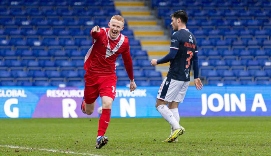 Airdrie's Adam Devine celebrates after scoring to make it 4-0 during an SPFL Championship match between Ross County and Airdrieonians at The Global Energy Stadium, Dingwall, on April 4, 2026. 