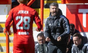 Aberdeen manager Stephen Robinson praises players for delivering under pressure after first win as Dons boss