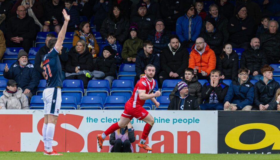 Airdrie's Lewis Strapp celebrates scoring to make it 1-0 in the SPFL Championship match between Ross County and Airdrieonians at The Global Energy Stadium at Victoria Park, Dingwall, on April 4, 2026. The game ended in a 4-0 Airdrie victory. 