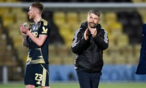 Aberdeen boss Stephen Robinson warns no player guaranteed a place in his squad next season after 2-2 draw at Livingston
