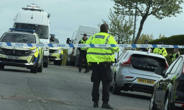 Armed police descend on Aberdeen street as man charged