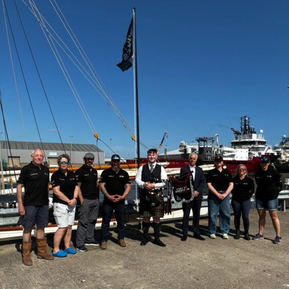 Bob Sanguinetti joined the Pellew crew to raise a flag at the Port of Aberdeen. Image: Supplied by Port of Aberdeen.