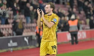 Former Aberdeen winger released by English Championship club