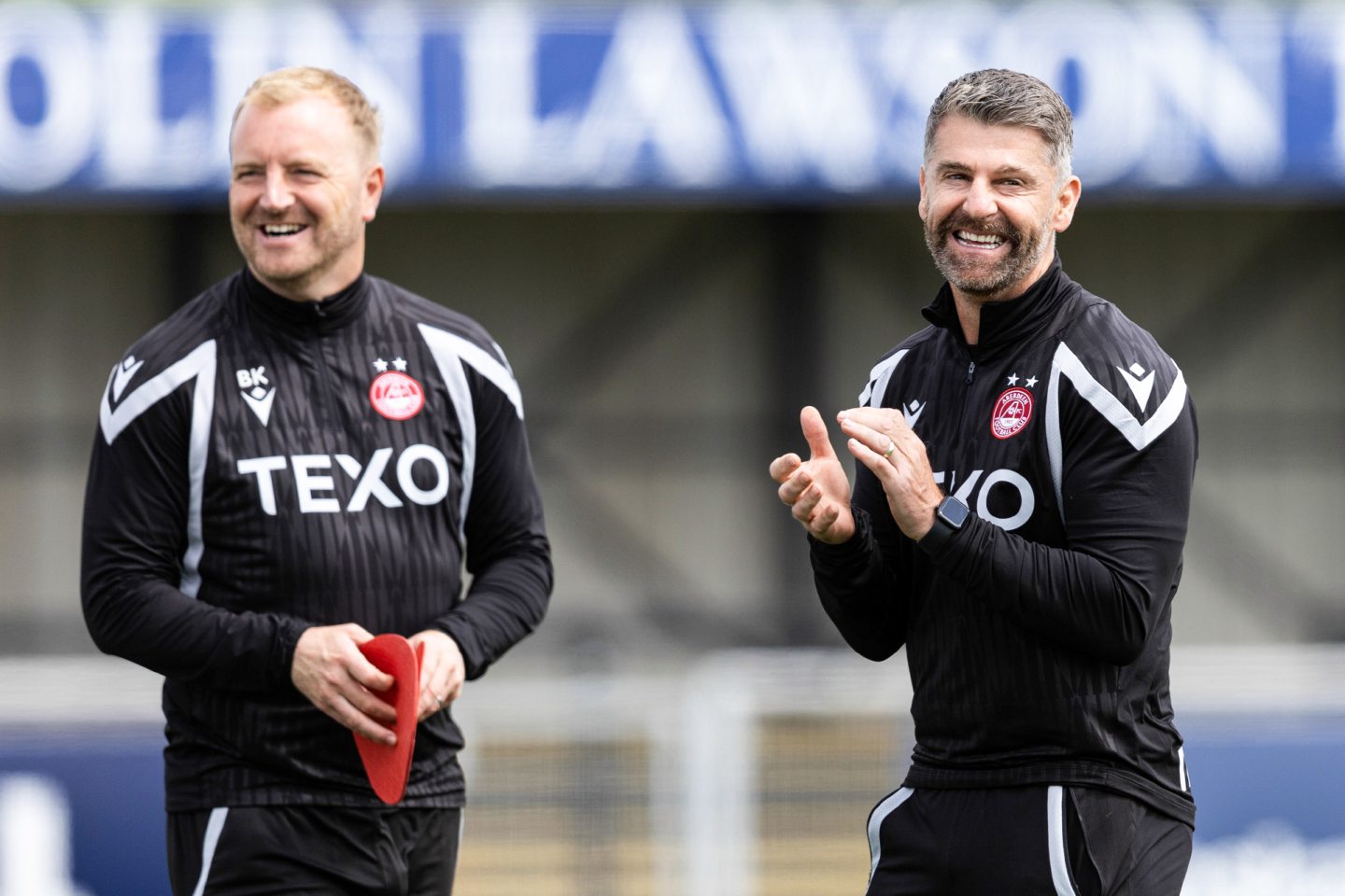 Aberdeen assistant coach Brian Kerr (L) and manager Stephen Robinson during a pre-season friendly at Cove Rangers.