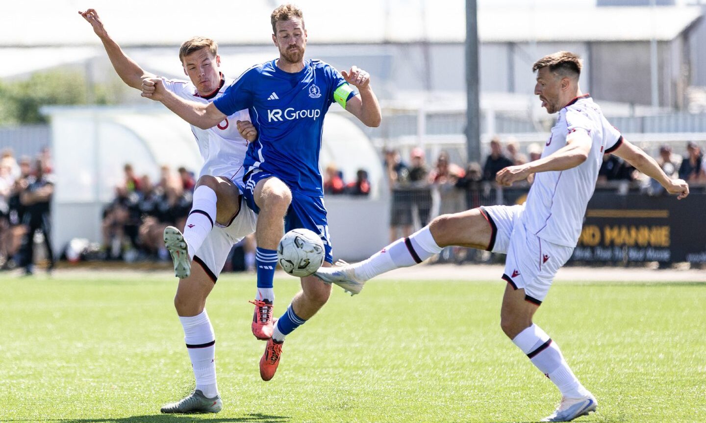 Aberdeen's Lewis Mayo, Cove Rangers' Jordan White and Aberdeen's Brad Lyons (L-R) in action during a pre-season friendly