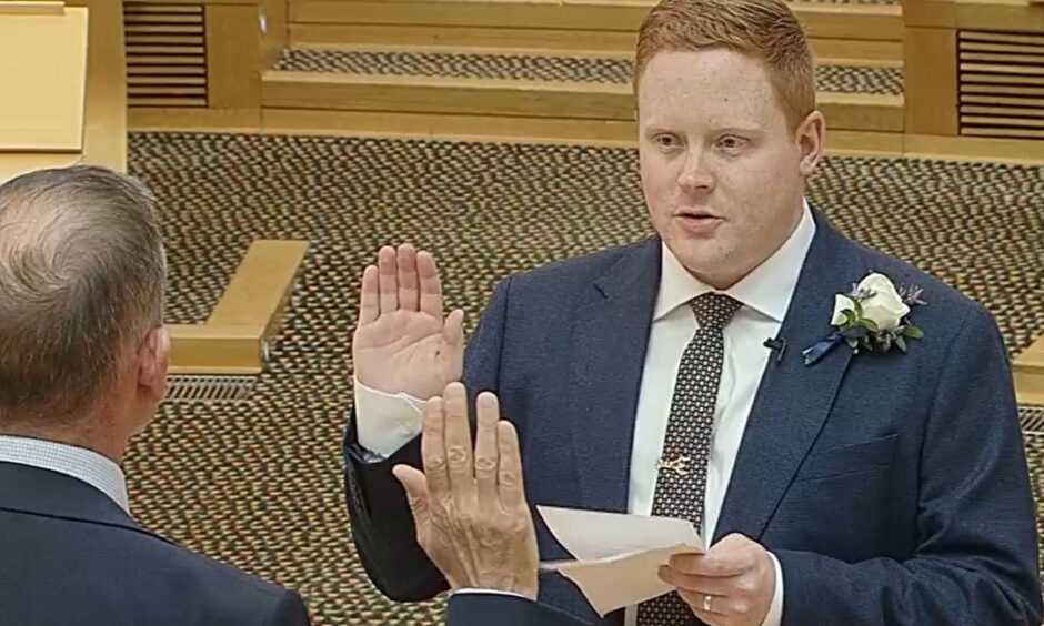 James Adam swearing in at Holyrood. Image: Scottish Conservatives/Supplied.