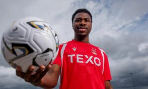 Aberdeen sign former Dundee loan winger Tony Yogane from Brentford on long-term deal