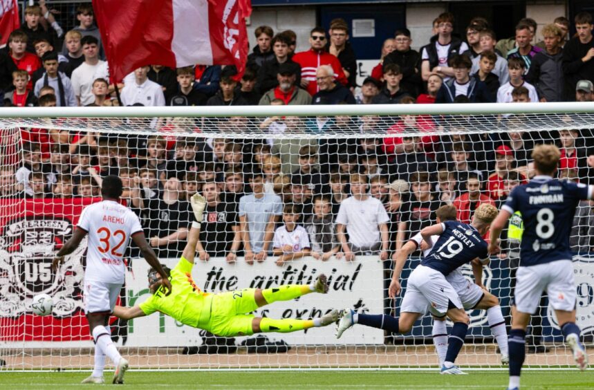 Dundee's Joe Westley scores to make it 1-0 against Aberdeen at Dens Park.
