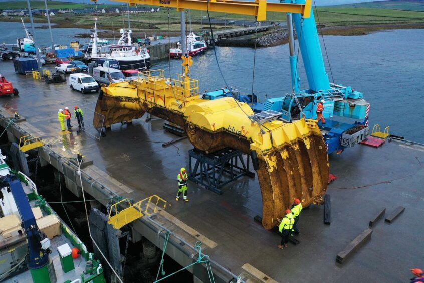 In the last few days, the 20-metre long, 38-tonne device, called called Blue X, has been towed from the European Marine Energy Centre’s (EMEC) Scapa Flow test site to Kirkwall.