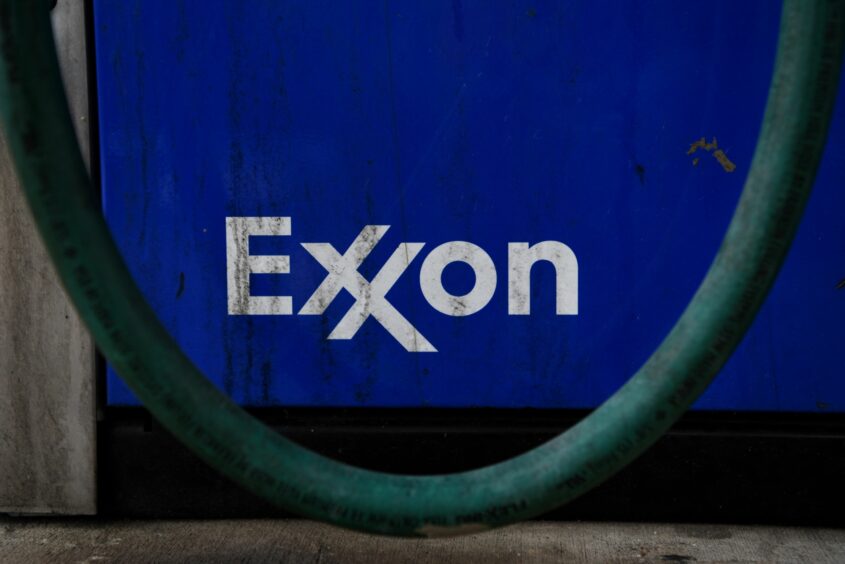 Signage at an Exxon Mobil Corp. gas station in Houston, Texas, U.S., on Wednesday, Oct. 28, 2020. Photographer: Callaghan O'Hare/Bloomberg