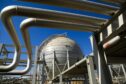 Storage sphere tanks for liquefied natural gas (LNG) sit near transfer pipes at Aqaba port, operated by Aqaba Development Corp., in Aqaba, Jordan, on Wednesday, April 11, 2018. Both the LNG and the liquefied petroleum gas (LPG) terminals were developed to secure the supply of gas resources after the disruption in Egyptian natural gas imports in 2010. Photographer: Annie Sakkab/Bloomberg