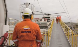 Repsol worker on a helipad.