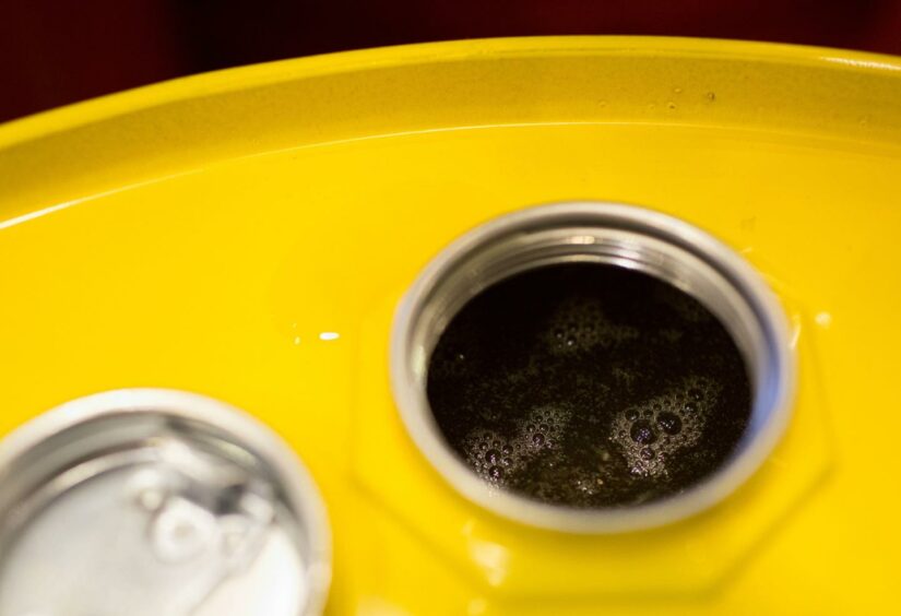 Bubbles form in lubricant oil inside a barrel at the Royal Dutch Shell Plc lubricants blending plant in Torzhok, Russia, on Wednesday, Feb. 7, 2018.  Photographer: Andrey Rudakov/Bloomberg