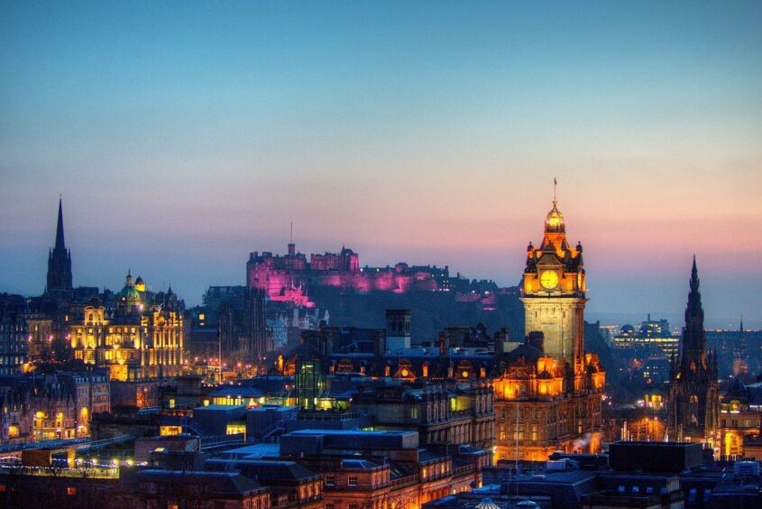 Evening view across Calton Hill towards Edinburgh Castle.