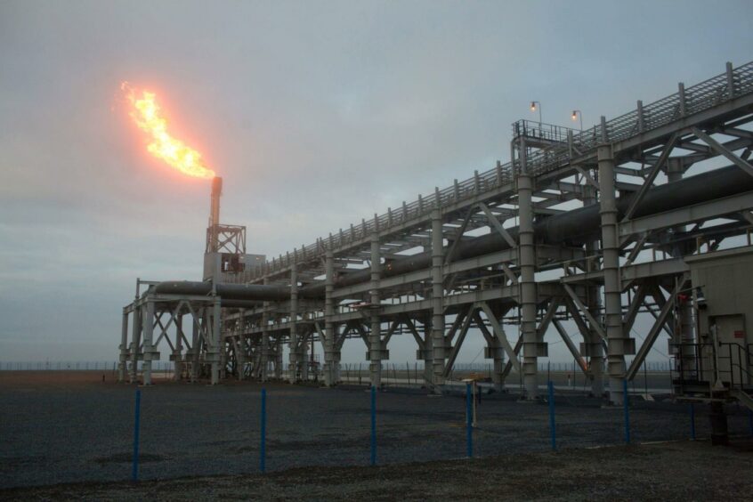 A gas flare, also known as a flare stack, burns at the Yamal LNG plant, operated by Novatek PJSC, in Sabetta, Russia, on Wednesday, Aug. 8, 2018. Novatek is one of the largest independent natural gas producers in Russia. Photographer: Andrey Rudakov/Bloomberg