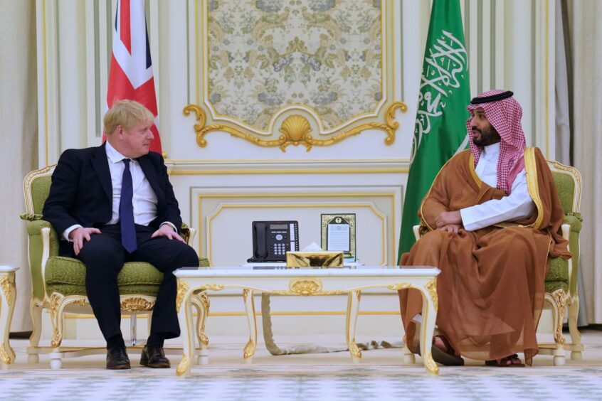 Prime Minister Boris Johnson is welcomed by Mohammed bin Salman Crown Prince of Saudi Arabia ahead of a meeting at the Royal Court in Riyadh, Saudia Arabia. The Prime Minister is on a one-day visit to Saudia Arabia and the United Arab Emirates to strengthen ties with the Gulf nations to tackle Russian President Vladimir Putin. Picture date: Wednesday March 16, 2022. Stefan Rousseau/PA Wire