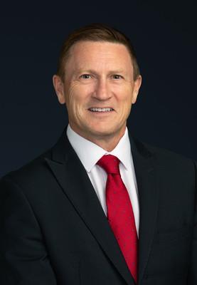 Head shot of man in dark suit