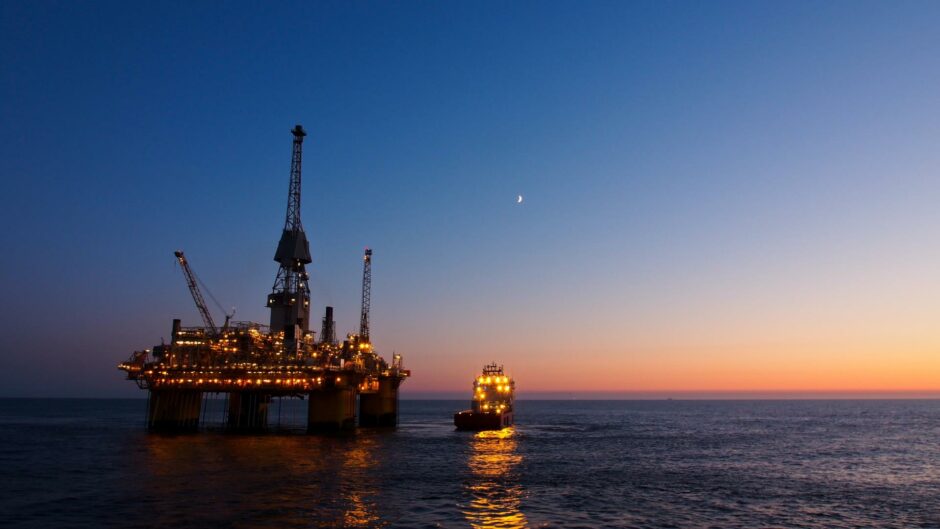 Silhouette of a floating production platform in the North Sea. 