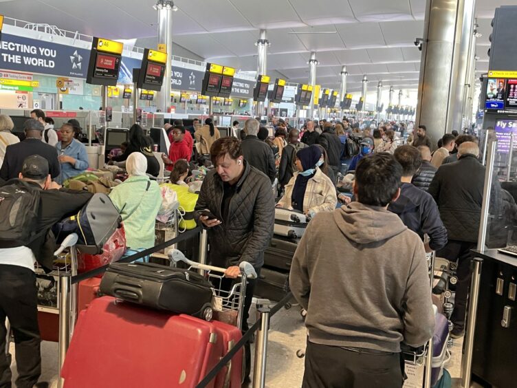Mandatory Credit: Photo by Story Picture Agency/Shutterstock (12891605c)
Queues of passengers are seen at Heathrow terminal 2 check in as travel chaos continues. The arrival of Easter weekend is expecting huge problems as airports have been chaos for weeks due to a lack in staff after the pandemic decimated their workforce.
Credit: Rick Findler / Story Picture Agency
Busy Heathrow airport, London, UK - 12 Apr 2022