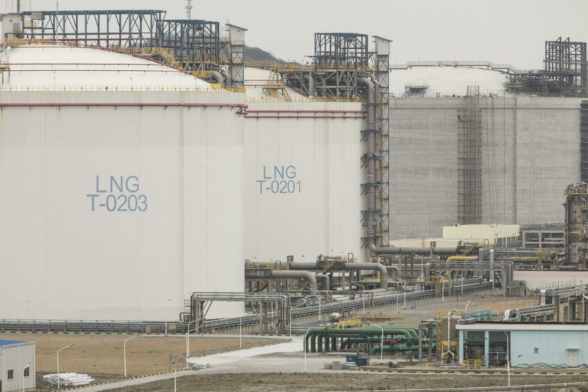 Storage silos stand at the liquid natural gas (LNG) terminal at the Yangshan Deep Water Port in Shanghai, China, on Tuesday, Feb. 4, 2020. Chinese officials are hoping the U.S. will agree to some flexibility on pledges in their phase-one trade deal, people familiar with the situation said, as Beijing tries to contain a health crisis that threatens to slow domestic growth with repercussions around the world.
