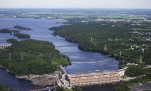 The Rio Tinto Plc Isle-Maligne hydropower plant stands in this aerial photograph taken over Saguenay, Quebec, Canada, on Wednesday, June 20, 2018. This picturesque corner of French-speaking Canada epitomizes the potential fallout of a trade war after the Trump administration's shock move to tax Canadian metal on the pretext of national security.