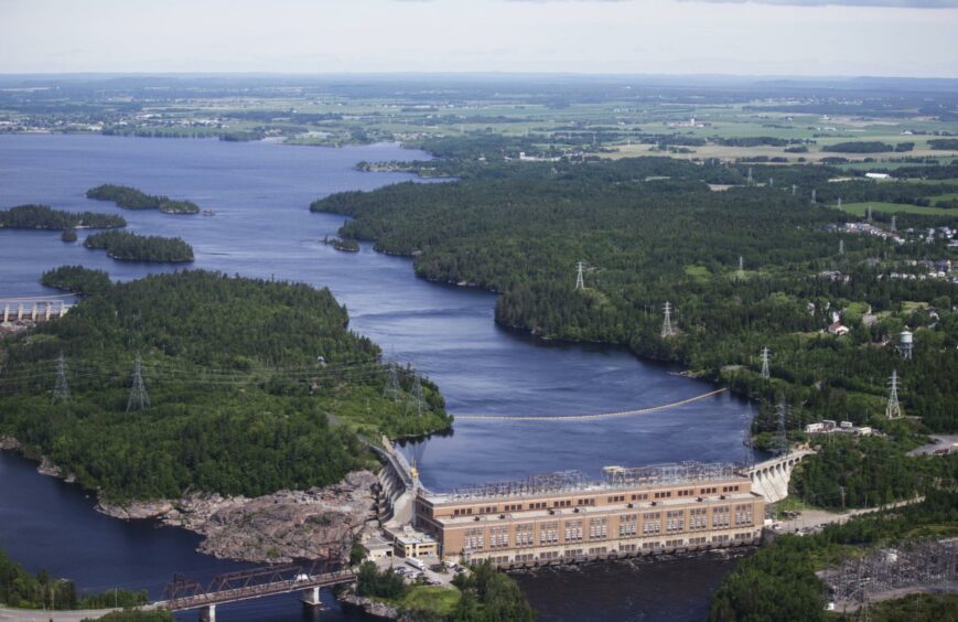 The Rio Tinto Plc Isle-Maligne hydropower plant stands in this aerial photograph taken over Saguenay, Quebec, Canada, on Wednesday, June 20, 2018. This picturesque corner of French-speaking Canada epitomizes the potential fallout of a trade war after the Trump administration's shock move to tax Canadian metal on the pretext of national security.