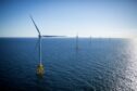 The GE-Alstom Block Island Wind Farm stands in the water off Block Island, Rhode Island, U.S., on Wednesday, Sept, 14, 2016. The installation of five 6-megawatt offshore-wind turbines at the Block Island project gives turbine supplier GE-Alstom first-mover advantage in the U.S. over its rivals Siemens and MHI-Vestas.