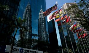 Reflection of the Petronas Towers in Kuala Lumpur, Malaysia.