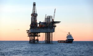 A picture of an offshore oil rig drilling platform in the North Sea
