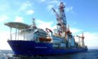 Blue hulled Tungsten Explorer Drillship on a sunny day