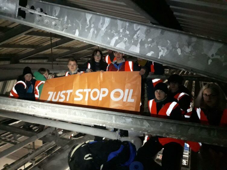 Protestors from Just Stop Oil inside the Nustar oil terminal.