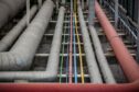 Gas pipes at the Enagas SA storage and distribution hub at the Port of Barcelona in Barcelona, Spain, on Tuesday, March 29, 2022. Photographer: Angel Garcia/Bloomberg