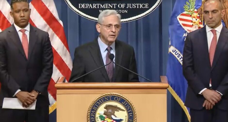 Man stands at US DOJ podium