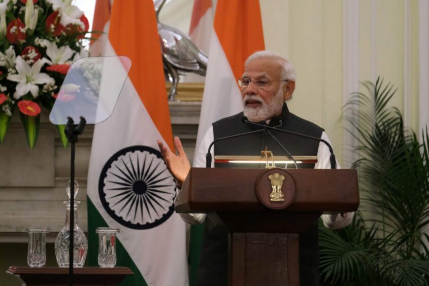 Narendra Modi, India's prime minister, speaks during a joint press conference with Fumio Kishida, Japan's prime minister, not pictured, at Hyderabad House in New Delhi, India, on Saturday, March 19, 2022.  Photographer: T. Narayan/Bloomberg