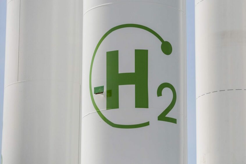 The chemical symbol for hydrogen on a storage tank during the final stages of construction at Iberdola SA's Puertollano green hydrogen plant in Puertollano, Spain, on Thursday, May 19, 2022. The new plant will be