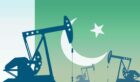 Drilling rigs with Pakistan flag in the background.