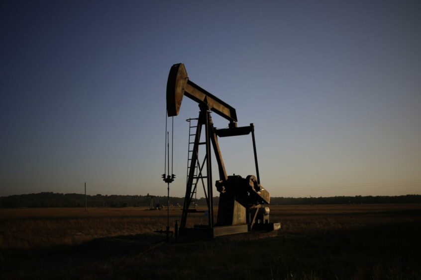 An oil pump jack at the New Harmony Oil Field in Grayville, Illinois, US, on Sunday, June 19, 2022.