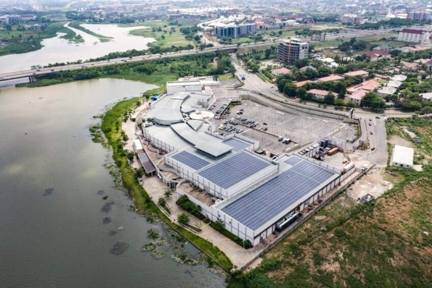 Aerial shot of mall with solar panels on roof