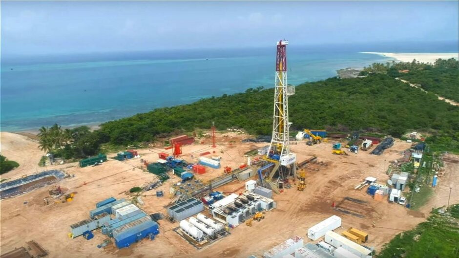 Aerial shot of drilling rig by the coast